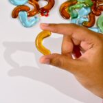 Glass Gem Stone, Flat Round Marbles Pebbles for Vase Fillers, Attractive pebbles for Aquarium Fish Tank. - Back View ...