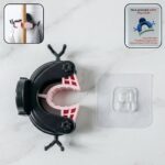 Antler style wall mounted mop and broom holder