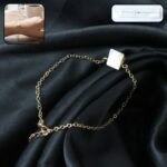 Elegant adjustable chain bracelet with square stone charm