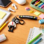Rainbow strap cartoon football boy keychain