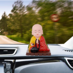 Red Solar Powered Sitting Buddha Statue for Home Decor