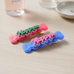 Cute “Happy” Bone-Shaped Snap Hair Clips Set (4 Pc) - Image 5