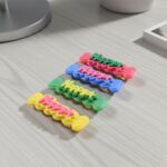 Cute “Happy” Bone-Shaped Snap Hair Clips Set (4 Pc) - Image 7