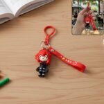 Cute red hair cartoon girl silicone keychain with wrist loop