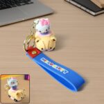 Cute cartoon cat riding toy car silicone keychain with wrist strap