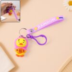 Cute cartoon duck keychain with rainbow strap