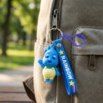 Cute Cartoon Character Keychain with Silicone Strap & Carabiner Clip – 1 Pc - Image 3